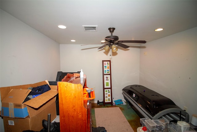 interior space featuring ceiling fan