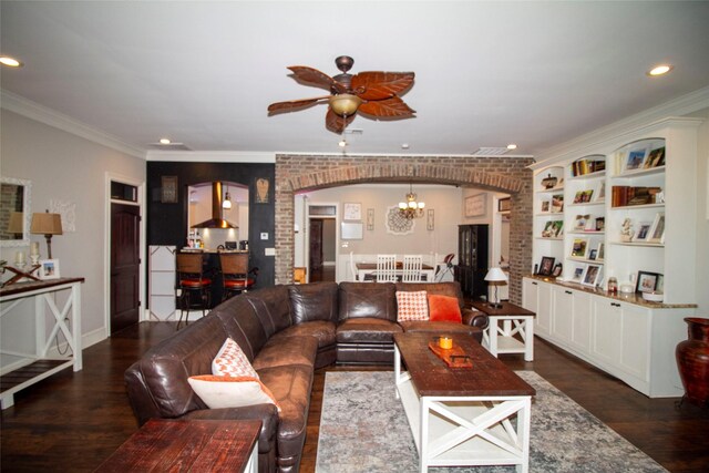 4201 Linda Ln, Shreveport, LA 71107 - living room with arched walkways, ceiling fan, a chandelier, dark wood finished floors, and recessed lighting
