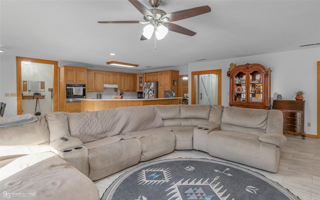 living room with ceiling fan