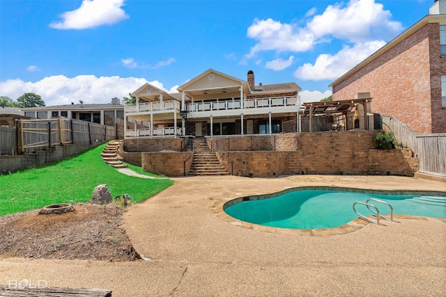 view of pool with a pergola, a patio area, and a yard