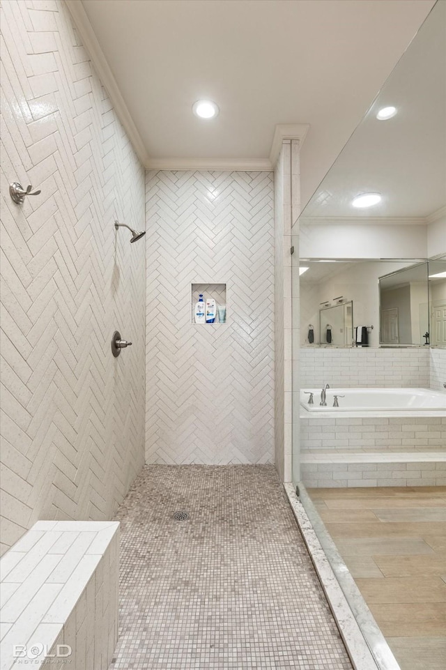 bathroom with independent shower and bath and crown molding