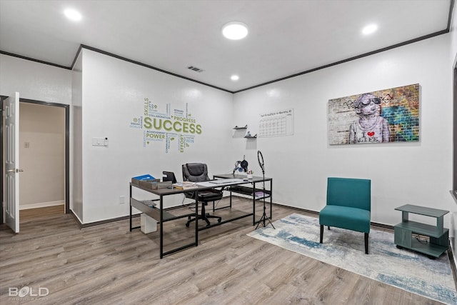 home office featuring ornamental molding and wood-type flooring