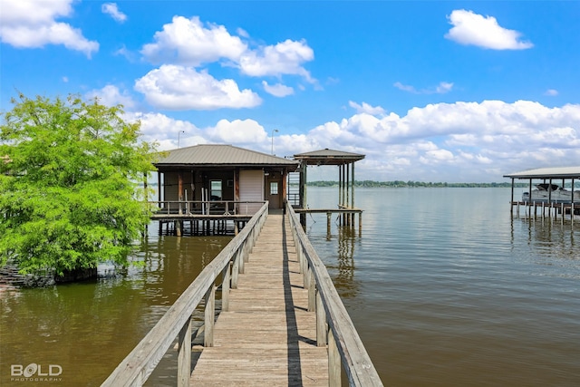 dock area with a water view