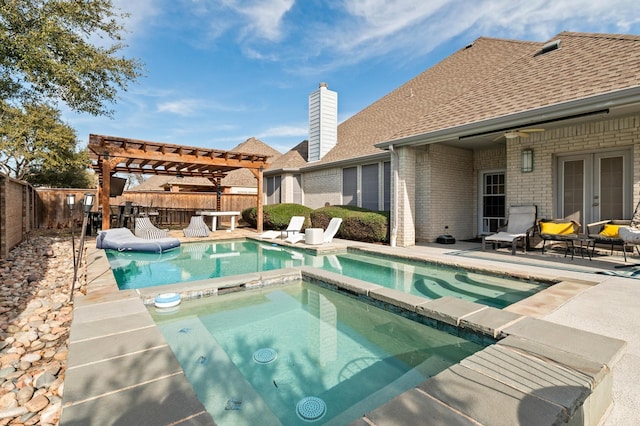 view of pool featuring a pergola, an in ground hot tub, and a patio