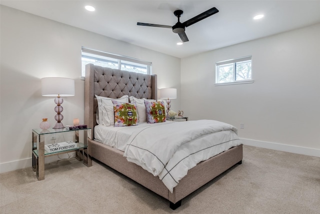 carpeted bedroom with ceiling fan