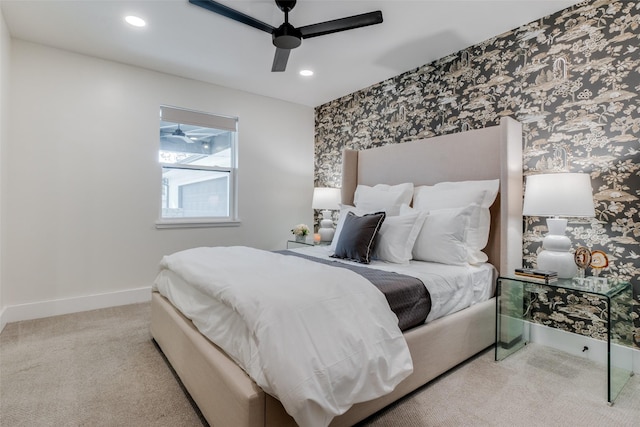 carpeted bedroom with ceiling fan