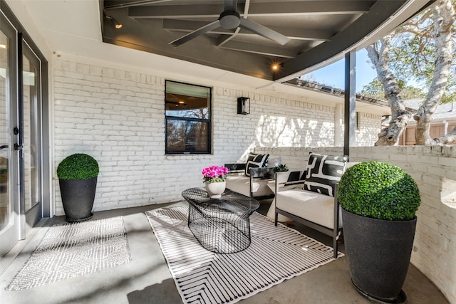 view of patio / terrace featuring ceiling fan and outdoor lounge area