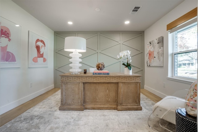 home office featuring hardwood / wood-style floors