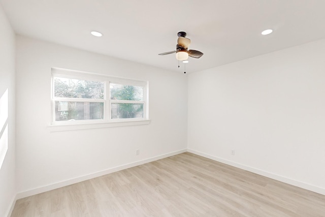 unfurnished room with light hardwood / wood-style floors and ceiling fan