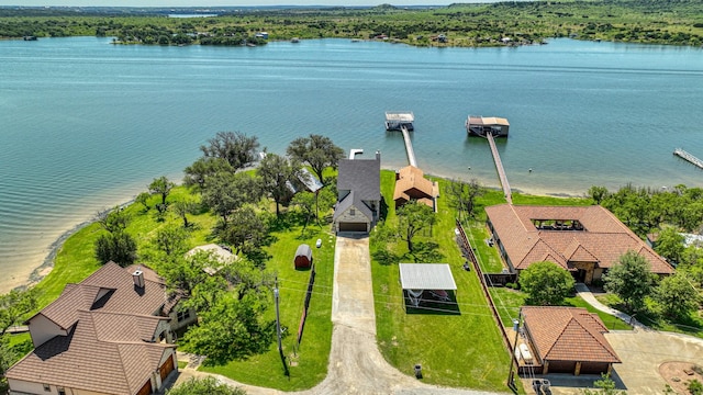 drone / aerial view with a water view