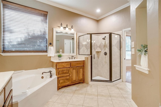 bathroom with separate shower and tub, vanity, tile patterned floors, and crown molding