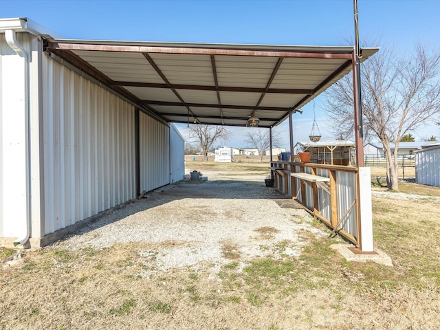 view of parking with a carport