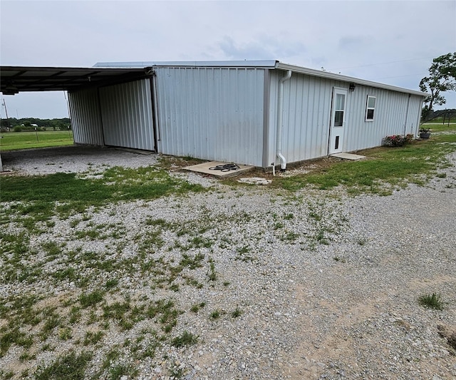 view of outbuilding featuring an outdoor structure