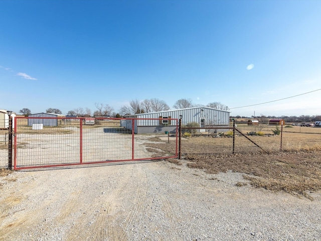 view of yard featuring a gate and fence
