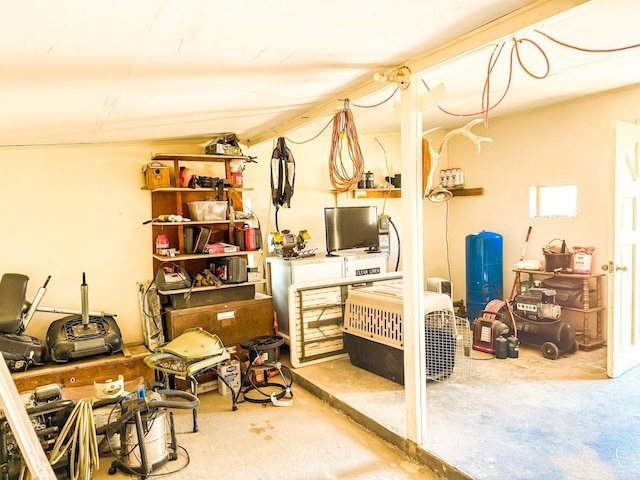 interior space with concrete flooring and a workshop area