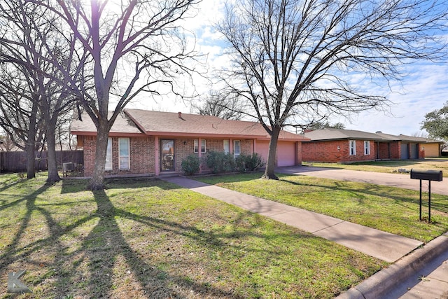 single story home featuring a front yard, central AC, and a garage