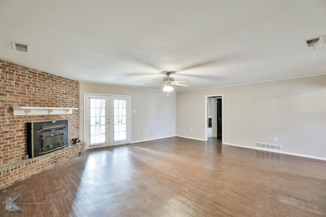 unfurnished living room featuring ceiling fan, french doors, and dark hardwood / wood-style flooring