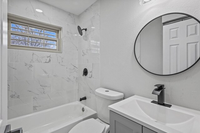 3832 Stateoak Dr, Dallas, TX 75241 - bathroom with toilet, shower / bathtub combination, vanity, and a textured wall