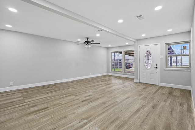 foyer with ceiling fan, light wood-type flooring, and plenty of natural light