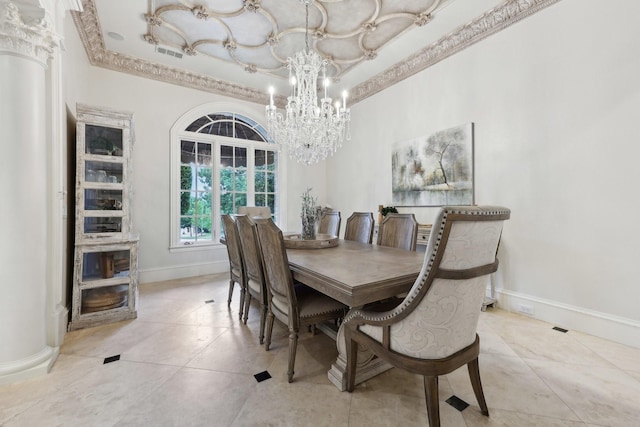 dining space featuring a notable chandelier, light tile patterned floors, a raised ceiling, and decorative columns