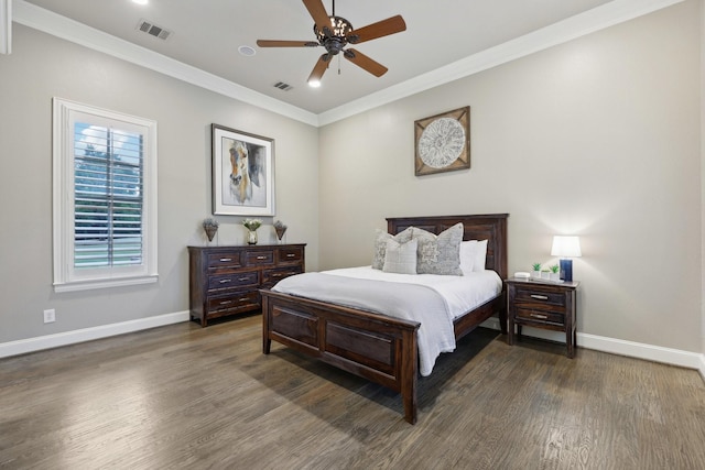 bedroom with ceiling fan, dark wood-type flooring, and ornamental molding