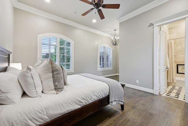 bedroom featuring ensuite bathroom, dark wood-type flooring, ceiling fan with notable chandelier, and ornamental molding