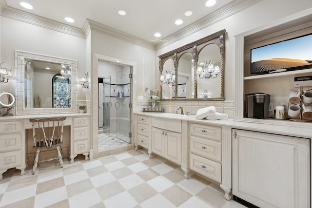 bathroom featuring an enclosed shower and vanity