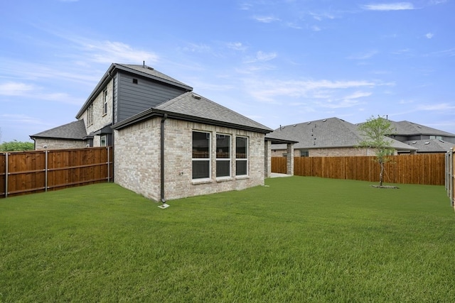 13728 Riola Dr, Little Elm, TX 75068 - rear view of house with roof with shingles and brick siding