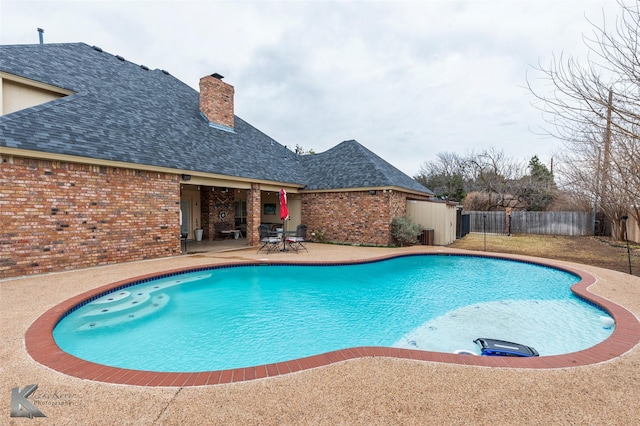 view of pool featuring a patio area