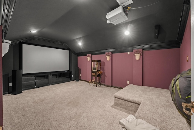 home theater room featuring light colored carpet and lofted ceiling