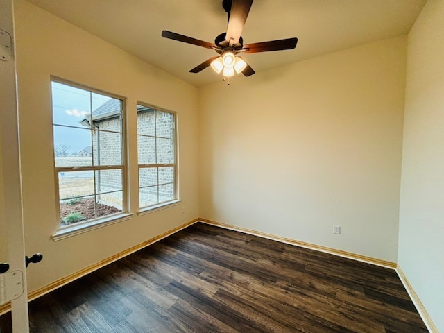 unfurnished room featuring dark hardwood / wood-style floors and ceiling fan