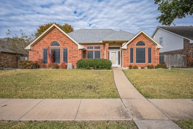 view of front facade with a front yard