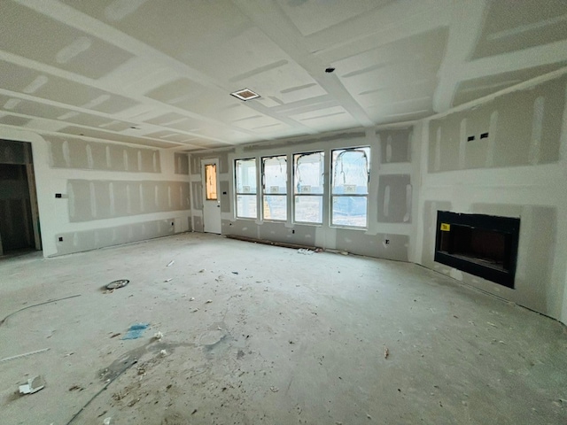 unfurnished living room featuring a fireplace