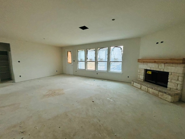 unfurnished living room with a fireplace