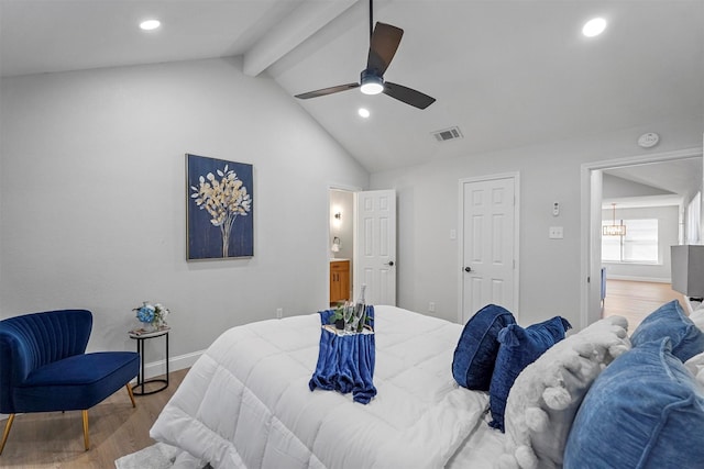 bedroom with ceiling fan, light hardwood / wood-style flooring, and vaulted ceiling with beams