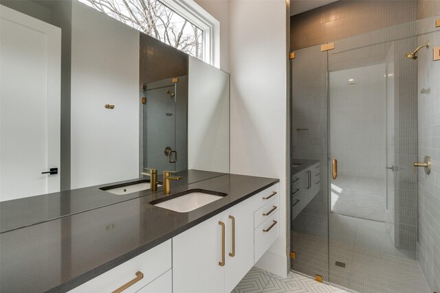 5808 Brookstown Dr, Dallas, TX 75230 - bathroom featuring a shower stall, vanity, and tile patterned flooring