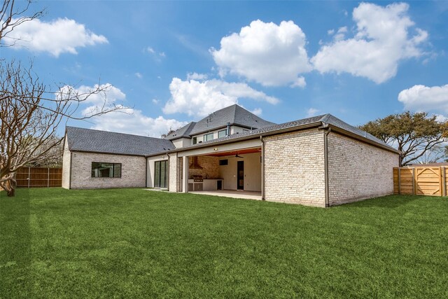 5808 Brookstown Dr, Dallas, TX 75230 - back of house with brick siding, a patio area, and roof with shingles