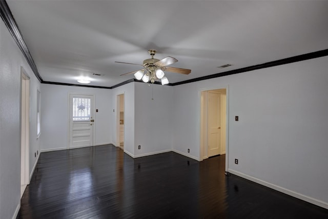 spare room with ceiling fan, dark hardwood / wood-style flooring, and ornamental molding