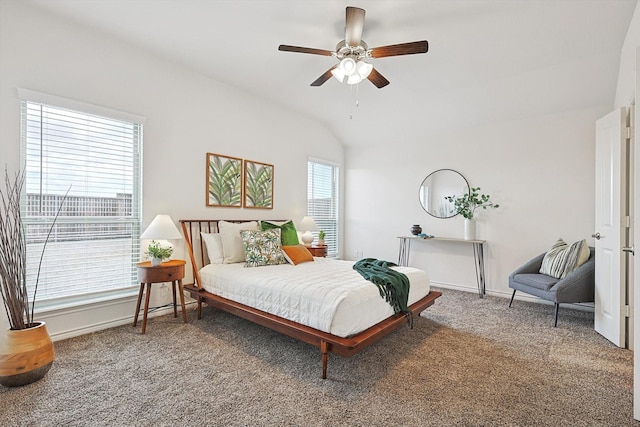 bedroom with ceiling fan, carpet, and vaulted ceiling