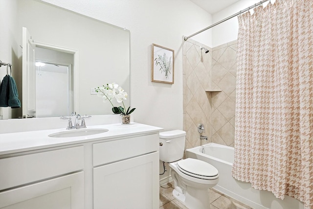 full bathroom featuring toilet, tile patterned flooring, vanity, and shower / tub combo with curtain