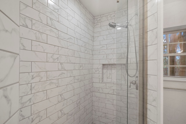 bathroom featuring walk in shower