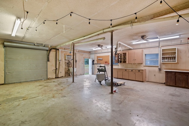 garage with an AC wall unit