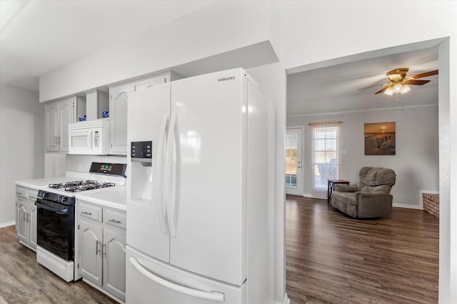 kitchen featuring ceiling fan, dark wood-type flooring, white appliances, and crown molding