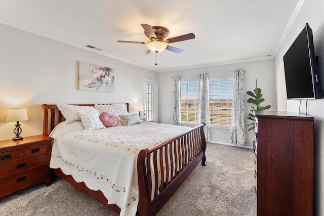 bedroom with light carpet, ceiling fan, and ornamental molding