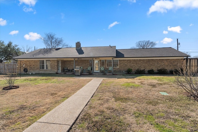 view of front of home with a front lawn