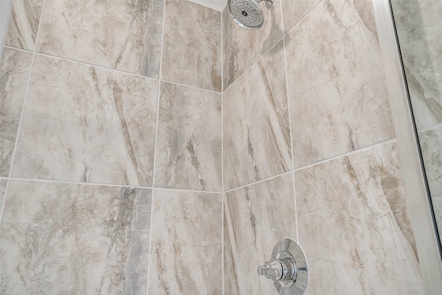 room details with a tile shower