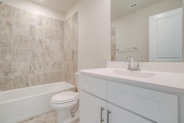 full bathroom featuring vanity, bathtub / shower combination, and toilet