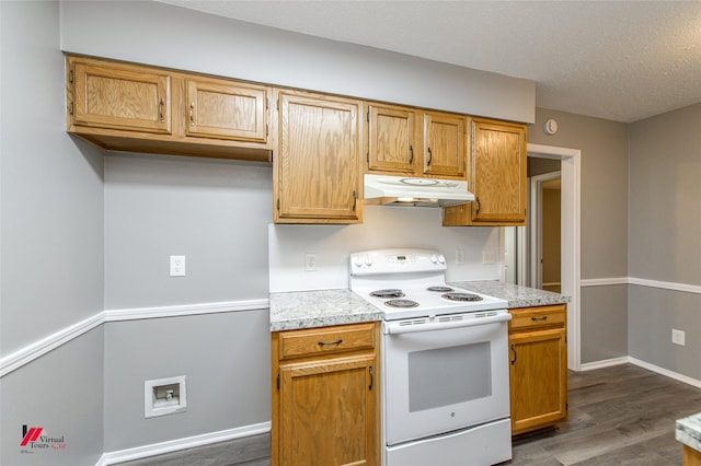 kitchen featuring white electric range and dark hardwood / wood-style flooring