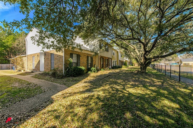 exterior space featuring a front lawn