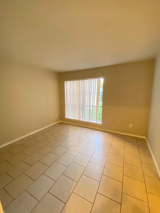 view of tiled empty room